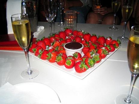 Is there a way to incorporate sweets, treats, or desserts into our lives without going hog wild? Pictured: Strawberries with Chocolate Dip and Champagne