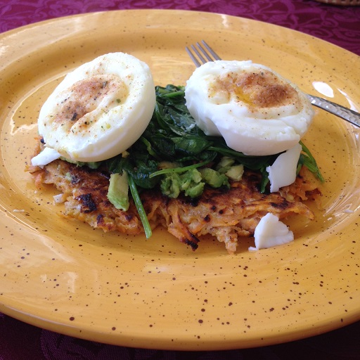 Poached Eggs over sweet potato's and sauteed spinach!